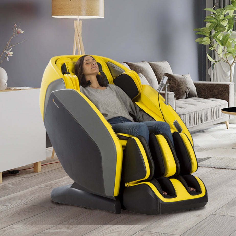 Woman sitting in Certus massage chair in Sun upholstery