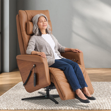 Circa ZG Chair shown in tan leather with oak accents, demonstrating zero-gravity recline position on light wooden floor