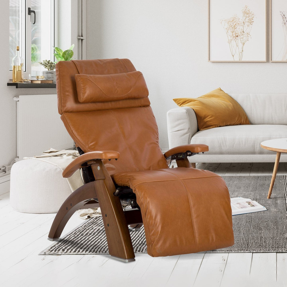 Perfect Chair PC-610 Omni-Motion Classic reclined in cognac leather with wooden base shown in modern living room setting