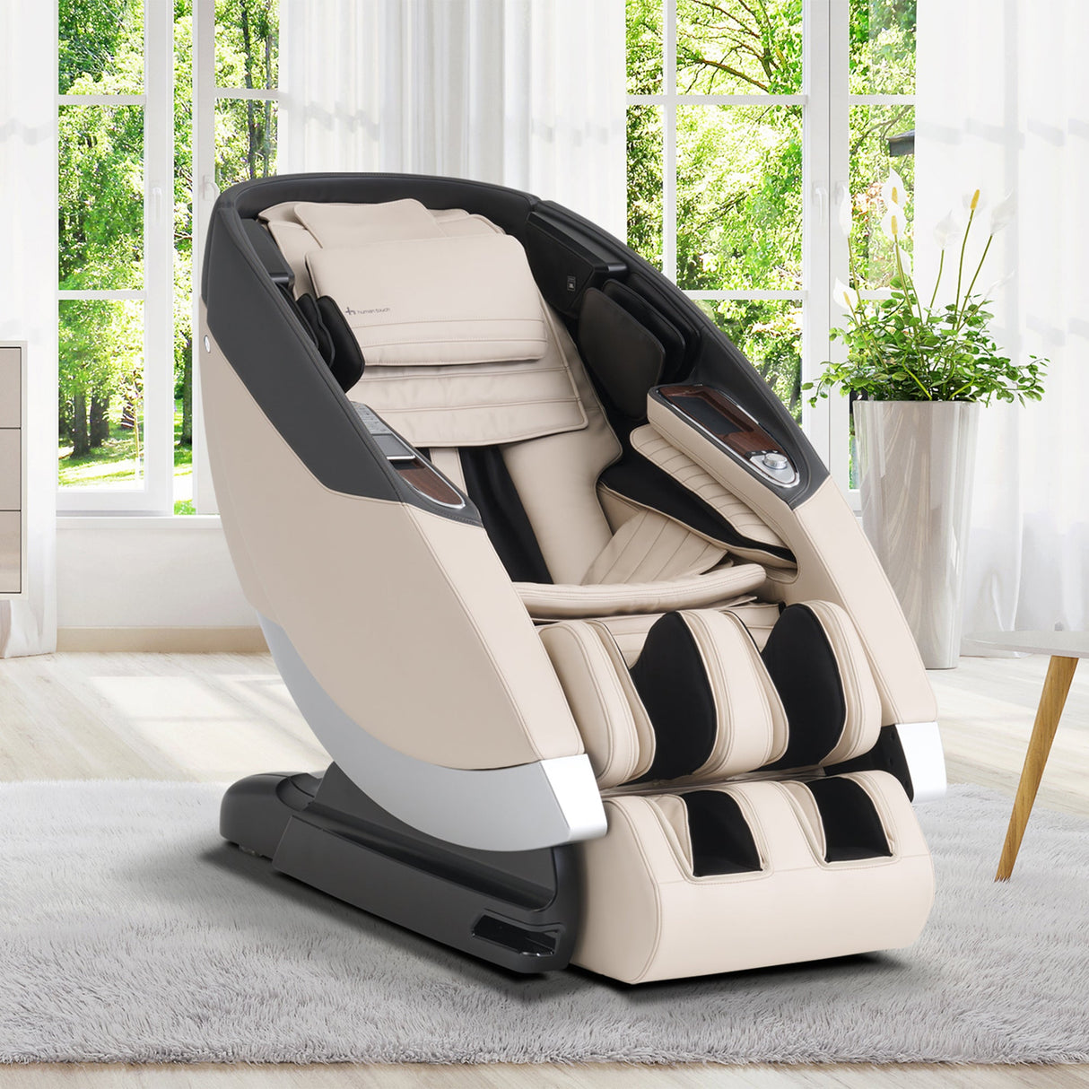 Super Novo 2.0 massage chair in cream and black with ergonomic design shown in bright modern living room setting