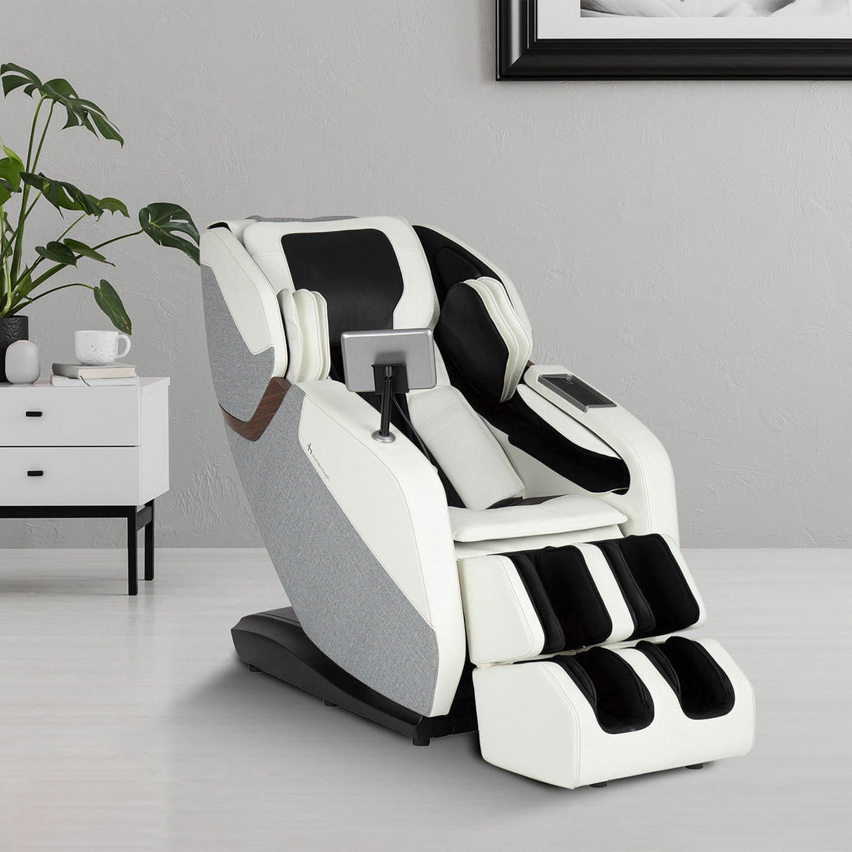 WholeBody® ROVE Massage Chair in white and black with advanced L-track and dynamic stretch features for full-body recovery.