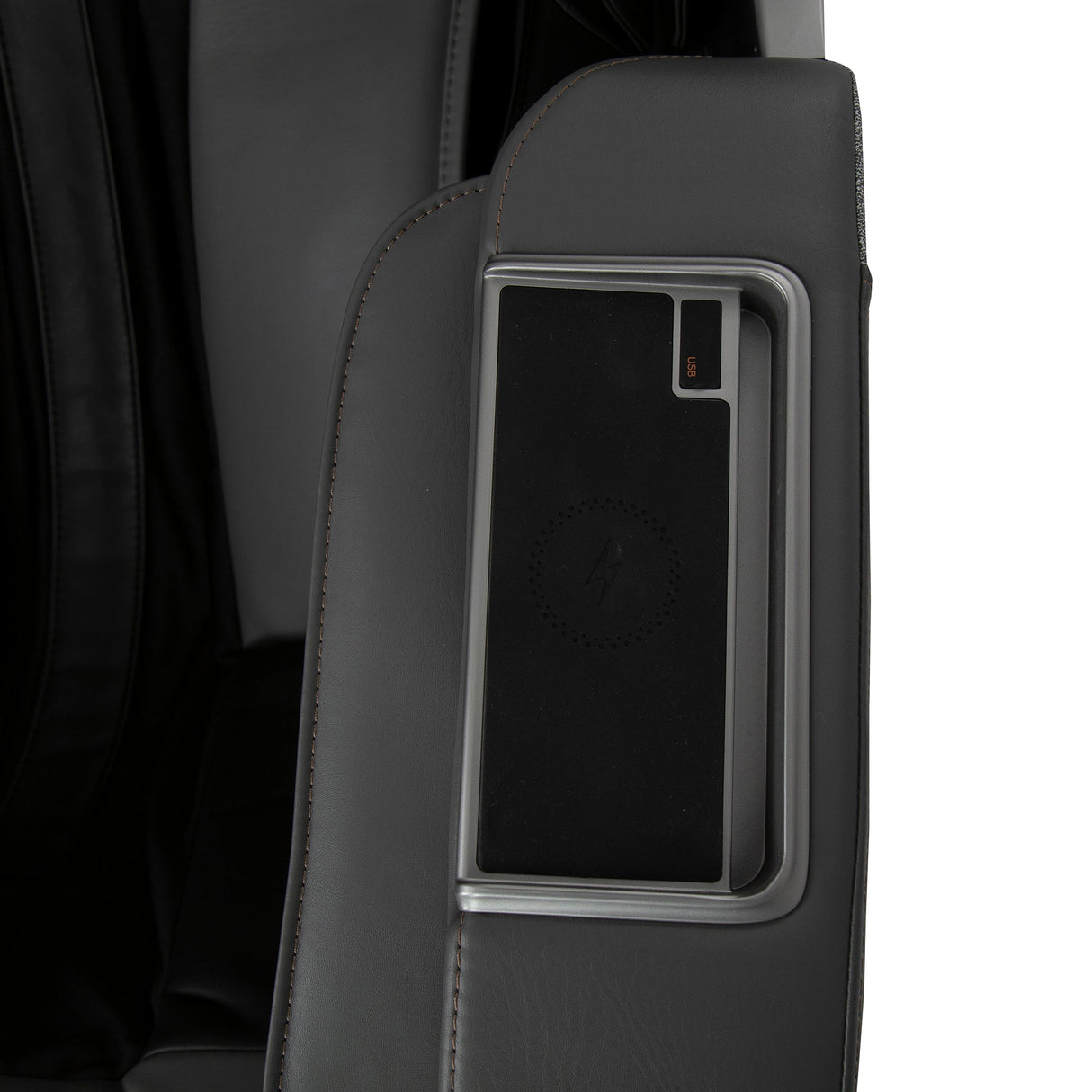 WholeBody® ROVE Massage Chair close-up of armrest with built-in control panel in black and gray leather.