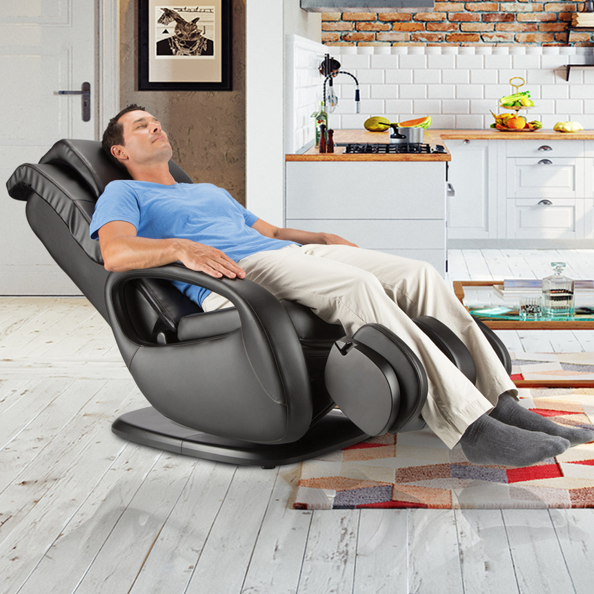 WholeBody 7.1 massage chair shown in modern kitchen, person relaxing in reclined position, demonstrating comfort features