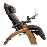 Perfect Chair Laptop Desk shown attached to brown leather recliner with wooden base, displaying adjustable mounting arm