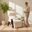 White Hale Premier Zero Gravity massage chair in living room with woman next to it.